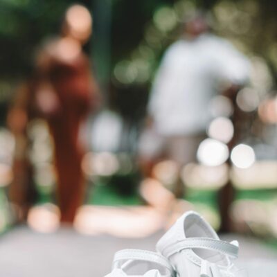 Baby Shoes on Pavement