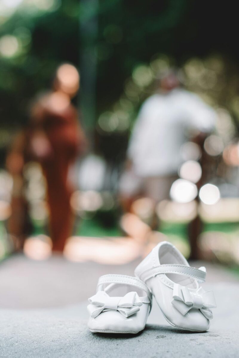 Baby Shoes on Pavement