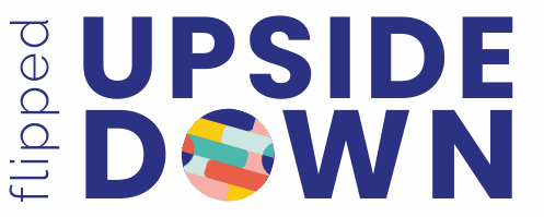 Word flipped is written vertically in blue. The word upside down is written in blue capital letters with a solid O that is multicolored